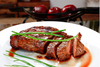 Apple Smoked BBQ Steak, Warm Loaded Potato Salad, Lemon Broccolini