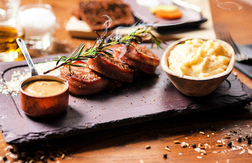Bacon Wrapped Pork Tenderloin, Chardonnay Dijon Sauce, Mashed Potatoes