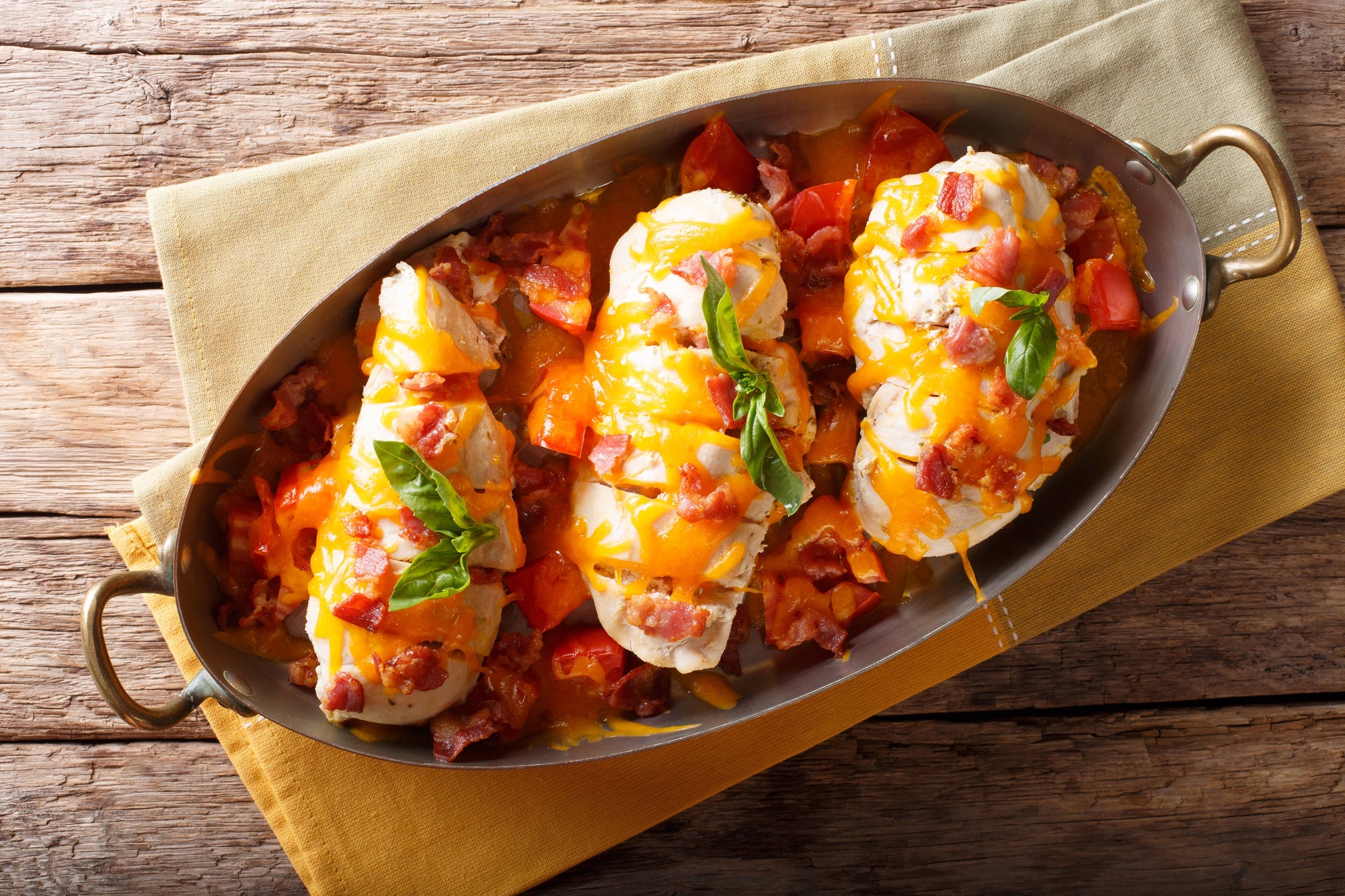 Buffalo Chicken with Twice Baked Potato. Our tender roasted chicken is seasoned with spices, topped mild buffalo sauce, green onions, cheese,  olive oil, black pepper, paired with our delicious twice baked potato,