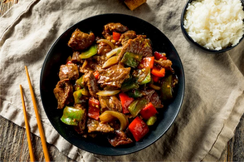 Chinese Pepper Steak. Our juicy skirt steak is bursting with juicy rich flavor. Marinated overnight for outstanding flavor with exceptional tenderness served and peppers and rice.