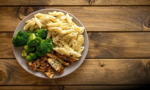 Chicken Broccoli Alfredo. Slow brined chicken is basted with basil citrus seasoning, grilled and served with penne pasta and a light EVOO lemon zest and white wine sauce and steamed broccoli. This dish is simply delicious, low fat and low in sodium dish.