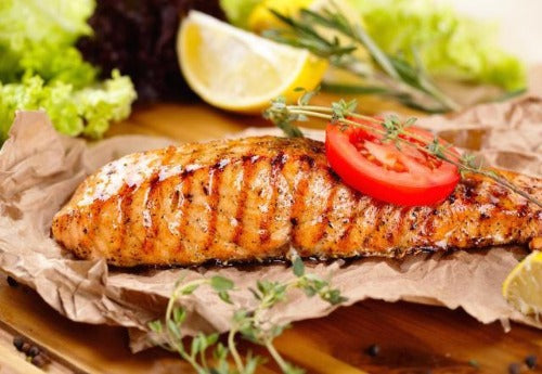 Our fresh organic salmon is basted with basil citrus seasoning and serves with our sautéed vegetables, served over spinach: is a healthy, low fat and low sodium dish, that is rich in flavor and generous in size. Paleo, Keto, diet, friendly.